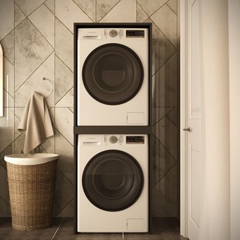 Otwarta szafka do pralki i suszarki w słupku